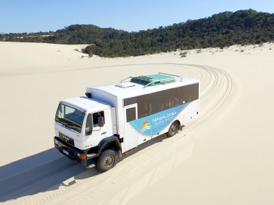 Desert Safari on sand dunes, 4wd touring truck, Tangalooma Island Resort, moreton island, brisbane.