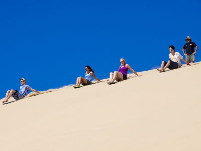 Sandboarding on Port Stephens huge dunes